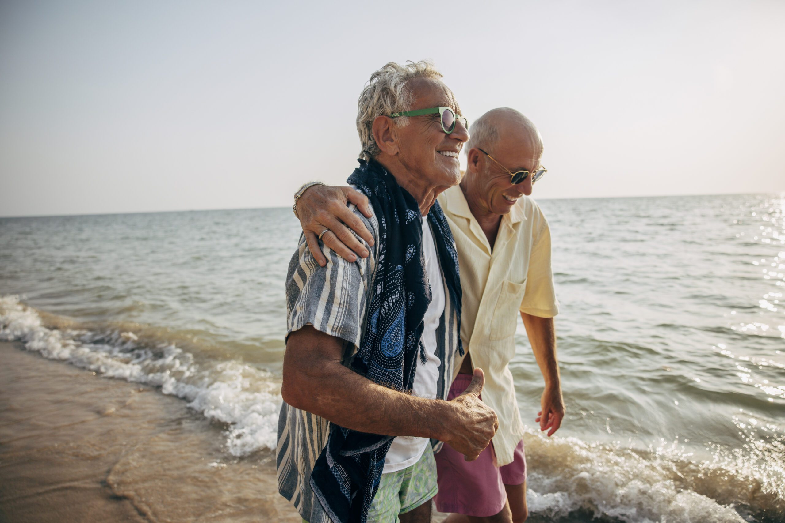 Senior couple on beach.